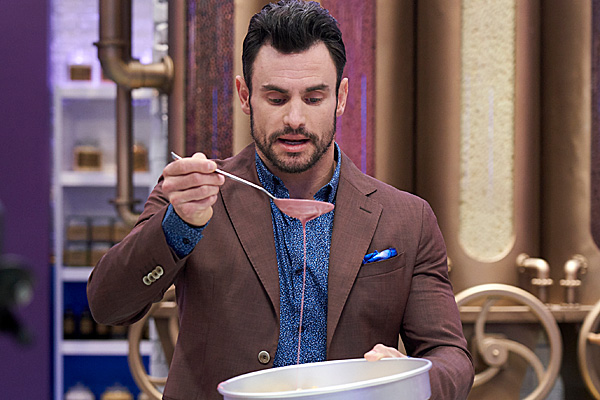 Steve Hodge demonstrates a chocolate panning technique on the set of Great Chocolate Showdown